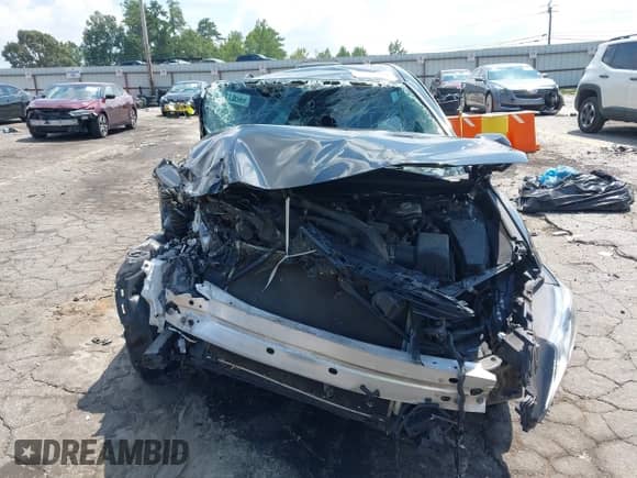 2022 Toyota Camry Hybrid LE with VIN 4T1C31AK2NU575304, listed as a IAAI auction lot 43017963 with 165,647 mi miles and . Bid and sale history available at DreamBid. Image 12.