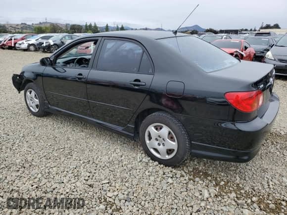 2003 Toyota Corolla CE z VIN 1NXBR32E43Z035870, wystawiony jako Copart lot #86801905 z przebiegiem 162 701 mil mil oraz Szkoda całkowita • Salvage title. Historia ofert i sprzedaży dostępna na DreamBid. Obrazek 2.