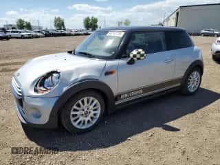 2015 MINI Hardtop with VIN WMWXM5C51F3A04184, listed as a Copart auction lot 63742035 with 150,029 mi miles and Salvage title. Bid and sale history available at DreamBid. Image 1.