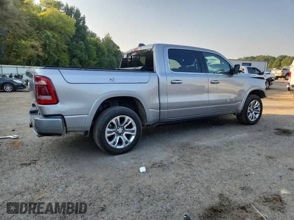 2020 Ram 1500 Longhorn with VIN 1C6SRFKT0LN388709, listed as a Copart auction lot 81114635 with 82,592 mi miles and Salvage title. Bid and sale history available at DreamBid. Image 3.