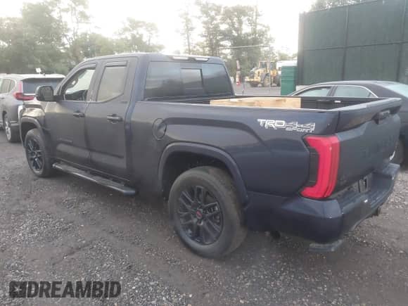 2024 Toyota Tundra SR5 with VIN 5TFLA5DAXRX152298, listed as a IAAI auction lot 43301564 with 23,958 mi miles and . Bid and sale history available at DreamBid. Image 3.