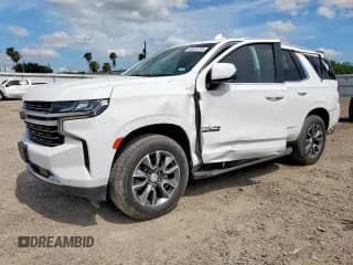 2021 Chevrolet Tahoe LT z VIN 1GNSKNKD8MR143092, wystawiony jako Copart lot #65554705 z przebiegiem 63 644 mil mil oraz Czysty tytuł • Clean title. Historia ofert i sprzedaży dostępna na DreamBid. Obrazek 1.
