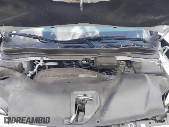 2020 Honda Pilot Touring 7-Passenger z VIN 5FNYF5H65LB021861, wystawiony jako IAAI lot #42305419 z przebiegiem 118 595 mil mil oraz . Historia ofert i sprzedaży dostępna na DreamBid. Obrazek 10.