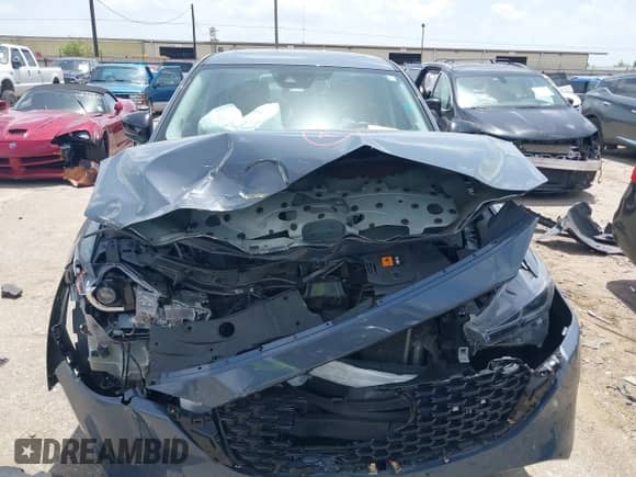 2022 Mazda CX-5 S Carbon Edition z VIN JM3KFBCM2N0571117, wystawiony jako IAAI lot #42535593 z przebiegiem 33 735 mil mil oraz . Historia ofert i sprzedaży dostępna na DreamBid. Obrazek 12.