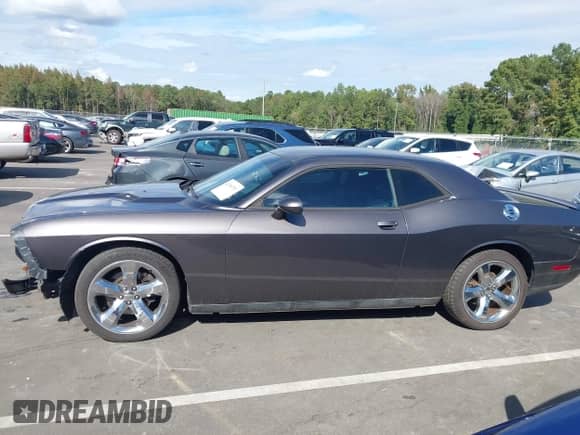 2013 Dodge Challenger SXT с VIN 2C3CDYAG0DH684162, выставлен на аукционе IAAI как лот 43399757 с пробегом 113 941 миль миль и . История ставок и продаж доступна на DreamBid. Изображение 14.