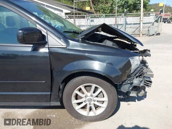 2016 Dodge Grand Caravan SXT with VIN 2C4RDGCG8GR212304, listed as a IAAI auction lot 43339029 with 120,513 mi miles and . Bid and sale history available at DreamBid. Image 18.