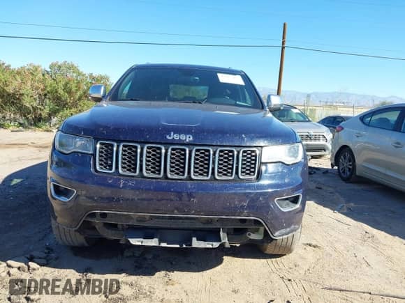 2018 Jeep Grand Cherokee Limited with VIN 1C4RJFBGXJC204693, listed as a IAAI auction lot 43335482 with 83,252 mi miles and . Bid and sale history available at DreamBid. Image 13.