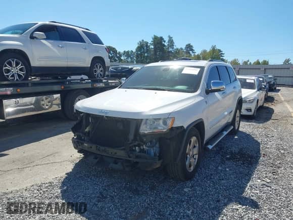 2013 Jeep Grand Cherokee Limited z VIN 1C4RJFBG8DC556272, wystawiony jako IAAI lot #43352592 z przebiegiem 118 793 mil mil oraz . Historia ofert i sprzedaży dostępna na DreamBid. Obrazek 18.