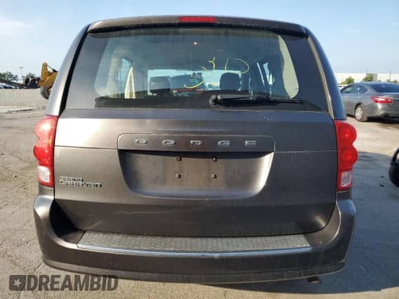 2015 Dodge Grand Caravan American Value with VIN 2C4RDGBG6FR568881, listed as a Copart auction lot 57935395 with 152,649 mi miles and Salvage title. Bid and sale history available at DreamBid. Image 6.