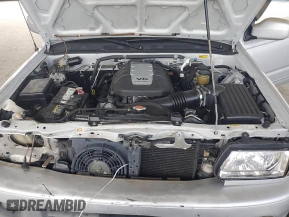 2000 Honda Passport LX with VIN 4S6CK58W3Y4401322, listed as a Copart auction lot 70466595 with 189,630 mi miles and Salvage title. Bid and sale history available at DreamBid. Image 11.
