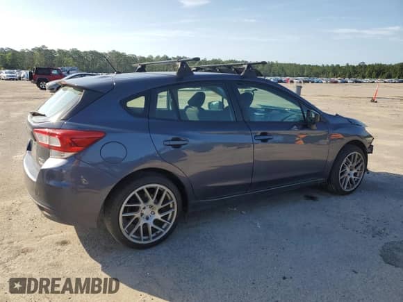 2017 Subaru Impreza with VIN 4S3GTAA62H1733901, listed as a Copart auction lot 60854405 with 135,234 mi miles and Clean title. Bid and sale history available at DreamBid. Image 3.