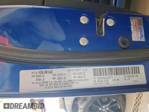 2018 Dodge Challenger SXT with VIN 2C3CDZAG9JH333770, listed as a Copart auction lot 59633595 with 76,709 mi miles and Salvage title. Bid and sale history available at DreamBid. Image 12.