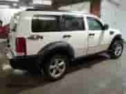 2007 Dodge Nitro SLT с VIN 1D8GU58K97W669625, выставлен на аукционе Copart как лот 79652324 с пробегом 102 954 миль миль и Списание • Salvage title. История ставок и продаж доступна на DreamBid. Изображение 3.