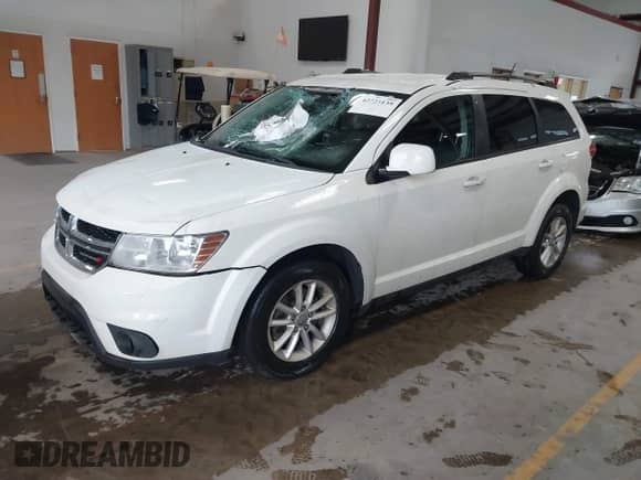 2017 Dodge Journey SXT with VIN 3C4PDDBG9HT618257, listed as a IAAI auction lot 42723139 with 105,486 mi miles and . Bid and sale history available at DreamBid. Image 2.