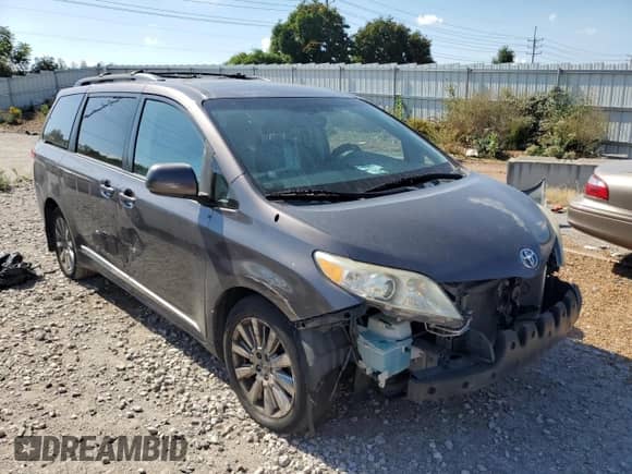 2012 Toyota Sienna XLE with VIN 5TDDK3DC5CS043722, listed as a Copart auction lot 81994915 with 228,523 mi miles and Salvage title. Bid and sale history available at DreamBid. Image 4.
