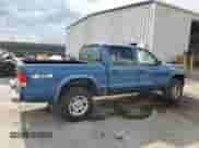 2003 Dodge Dakota SLT z VIN 1D7HG48N03S210327, wystawiony jako Copart lot #68267015 z przebiegiem 204 525 mil mil oraz Szkoda całkowita • Salvage title. Historia ofert i sprzedaży dostępna na DreamBid. Obrazek 3.
