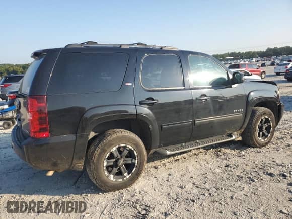 2009 Chevrolet Tahoe 2LT z VIN 1GNFK230X9R295149, wystawiony jako Copart lot #69832915 z przebiegiem 141 619 mil mil oraz Szkoda całkowita • Salvage title. Historia ofert i sprzedaży dostępna na DreamBid. Obrazek 3.