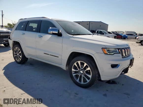 2017 Jeep Grand Cherokee Overland with VIN 1C4RJECG4HC965657, listed as a Copart auction lot 84400635 with 141,055 mi miles and Salvage title. Bid and sale history available at DreamBid. Image 4.