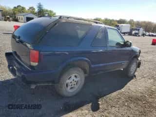 2001 Chevrolet Blazer LS с VIN 1GNCT18W21K182784, выставлен на аукционе Copart как лот 76004174 с пробегом 153 833 миль миль и Списание • Salvage title. История ставок и продаж доступна на DreamBid. Изображение 3.