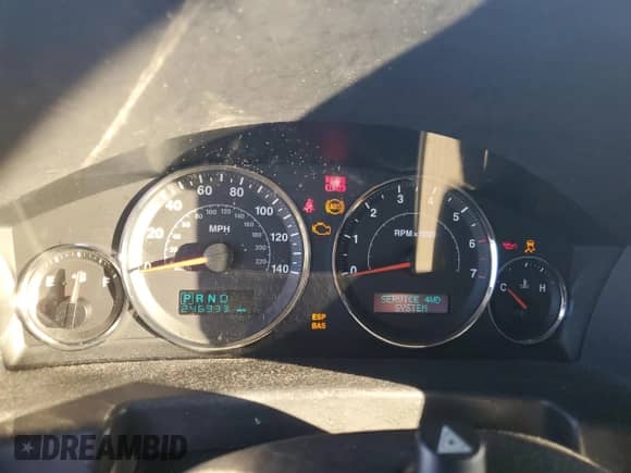 2007 Jeep Commander Limited z VIN 1J8HG58217C591460, wystawiony jako Copart lot #44587295 z przebiegiem 246 933 mil mil oraz Szkoda całkowita • Salvage title. Historia ofert i sprzedaży dostępna na DreamBid. Obrazek 9.