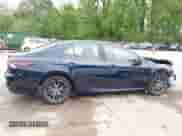 2021 Toyota Camry Hybrid XLE with VIN 4T1F31AK8MU563752, listed as a IAAI auction lot 42134620 with 19,484 mi miles and . Bid and sale history available at DreamBid. Image 14.