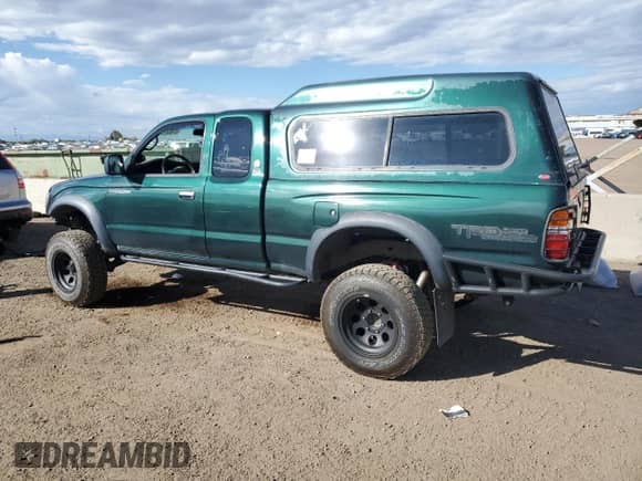 2000 Toyota Tacoma с VIN 4TAWN72N6YZ622408, выставлен на аукционе Copart как лот 81862725 с пробегом 275 084 миль миль и Списание • Salvage title. История ставок и продаж доступна на DreamBid. Изображение 2.