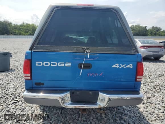2001 Dodge Dakota Sport with VIN 1B7GG22N61S246488, listed as a Copart auction lot 55650825 with 142,192 mi miles and Salvage title. Bid and sale history available at DreamBid. Image 6.