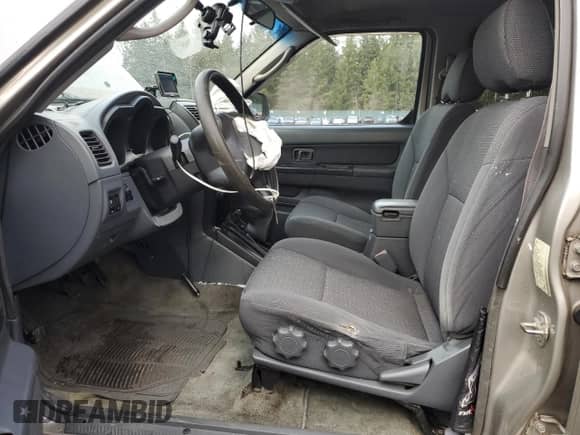 2003 Nissan Frontier XE with VIN 1N6ED29Y43C414977, listed as a Copart auction lot 43938595 with 212,303 mi miles and Salvage title. Bid and sale history available at DreamBid. Image 7.