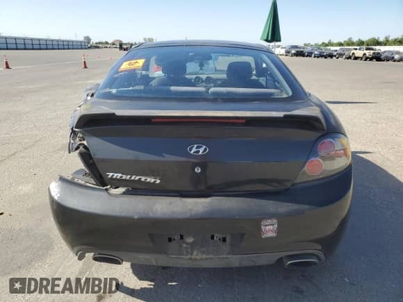 2008 Hyundai Tiburon GS с VIN KMHHM66D08U266221, выставлен на аукционе Copart как лот 58016965 с пробегом 134 420 миль миль и Списание • Salvage title. История ставок и продаж доступна на DreamBid. Изображение 6.