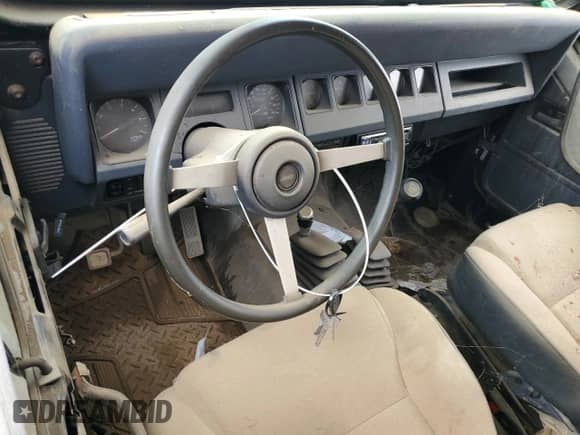 1993 Jeep Wrangler S z VIN 1J4FY19P3PP235044, wystawiony jako Copart lot #50286735 z przebiegiem 203 257 mil mil oraz Szkoda całkowita • Salvage title. Historia ofert i sprzedaży dostępna na DreamBid. Obrazek 8.