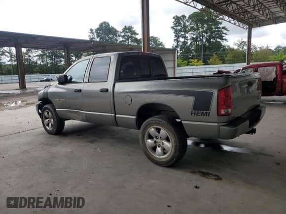 2005 Dodge 1500 SLT with VIN 1D7HU18D05S162958, listed as a Copart auction lot 69061115 with 174,808 mi miles and Salvage title. Bid and sale history available at DreamBid. Image 2.