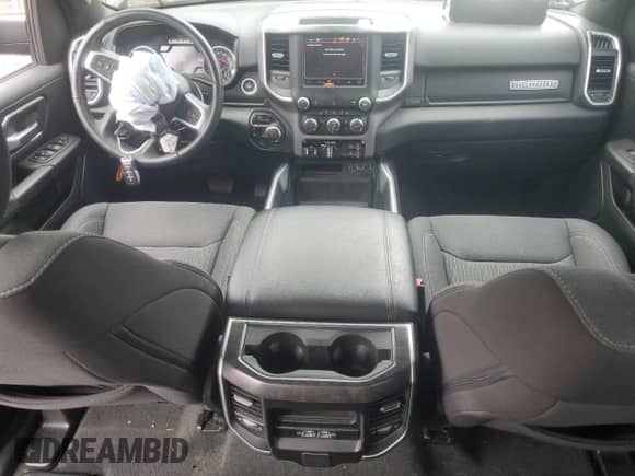 2023 Ram 1500 Big Horn with VIN 1C6SRFMT1PN605624, listed as a Copart auction lot 58951045 with 35,762 mi miles and Salvage title. Bid and sale history available at DreamBid. Image 8.