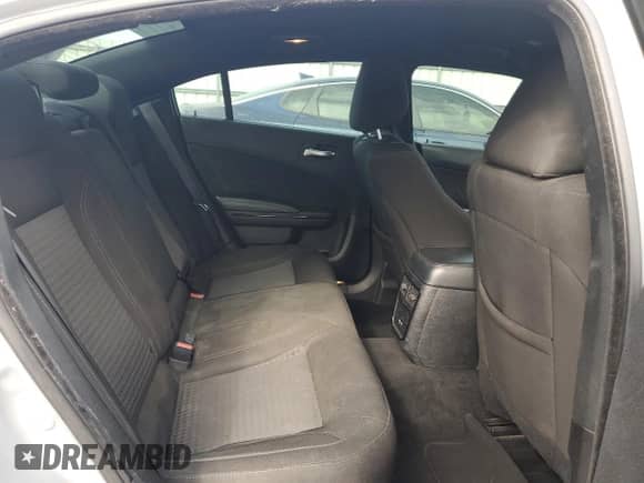 2020 Dodge Charger SXT с VIN 2C3CDXBG1LH241283, выставлен на аукционе Copart как лот 71236575 с пробегом 326 856 миль миль и Списание • Salvage title. История ставок и продаж доступна на DreamBid. Изображение 10.