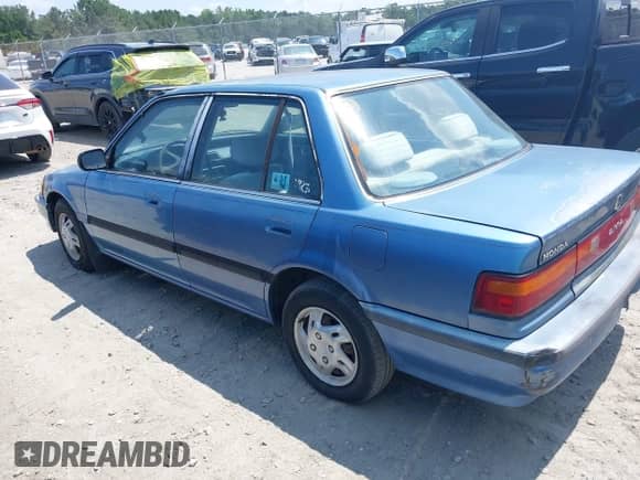 1991 Honda Civic z VIN 1HGED3656ML043956, wystawiony jako IAAI lot #42608632 z przebiegiem 163 524 mil mil oraz . Historia ofert i sprzedaży dostępna na DreamBid. Obrazek 3.