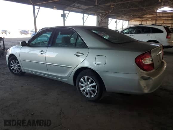 2003 Toyota Camry LE with VIN JTDBE32K330184641, listed as a Copart auction lot 86717825 with 110,616 mi miles and Salvage title. Bid and sale history available at DreamBid. Image 2.