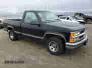 1997 Chevrolet Silverado 1500 with VIN 1GCEC14R5VZ187489, listed as a Copart auction lot 87211824 with 211,353 mi miles and Clean title. Bid and sale history available at DreamBid. Image 4.