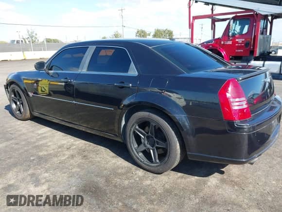 2006 Chrysler 300 C SRT-8 with VIN 2C3LA73W86H388896, listed as a IAAI auction lot 40599030 with 152,547 mi miles and . Bid and sale history available at DreamBid. Image 3.