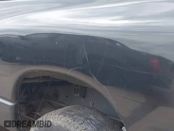 2007 Dodge 1500 SLT z VIN 3D7KR19D77G842727, wystawiony jako IAAI lot #41909108 z przebiegiem 202 619 mil mil oraz . Historia ofert i sprzedaży dostępna na DreamBid. Obrazek 17.