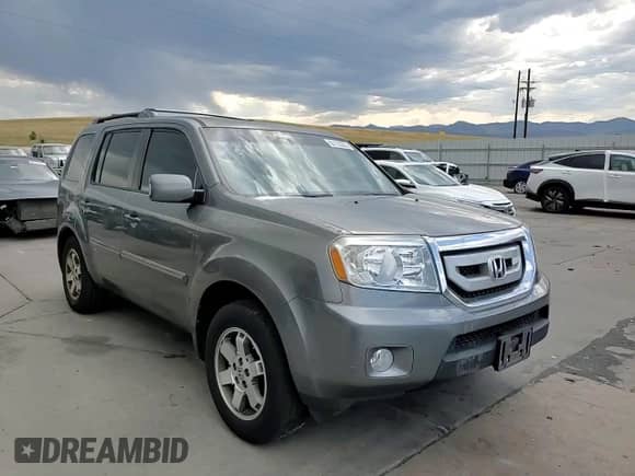 2009 Honda Pilot Touring with VIN 5FNYF48829B014693, listed as a Copart auction lot 65152355 with 160,961 mi miles and Salvage title. Bid and sale history available at DreamBid. Image 14.