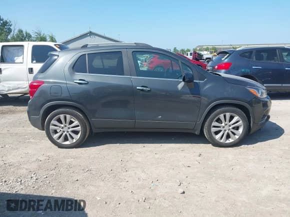 2018 Chevrolet Trax Premier with VIN 3GNCJMSB0JL290008, listed as a IAAI auction lot 43003407 with 113,095 mi miles and . Bid and sale history available at DreamBid. Image 13.