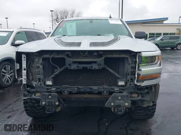 2016 Chevrolet Silverado 1500 Custom z VIN 1GCRCPEC9GZ365020, wystawiony jako IAAI lot #41772792 z przebiegiem 139 591 mil mil oraz . Historia ofert i sprzedaży dostępna na DreamBid. Obrazek 13.