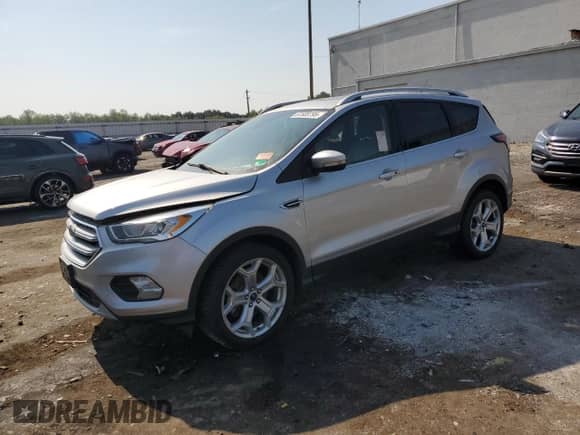 2017 Ford Escape Titanium с VIN 1FMCU9JDXHUC44245, выставлен на аукционе Copart как лот 67505795 с пробегом 172 039 миль миль и Чистый • Clean title. История ставок и продаж доступна на DreamBid. Изображение 1.