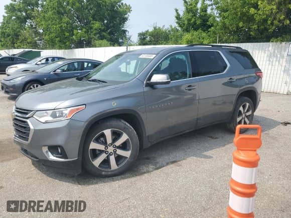 2021 Chevrolet Traverse LT z VIN 1GNEVHKW2MJ216527, wystawiony jako Copart lot #60195885 z przebiegiem 103 141 mil mil oraz Szkoda całkowita • Salvage title. Historia ofert i sprzedaży dostępna na DreamBid. Obrazek 1.