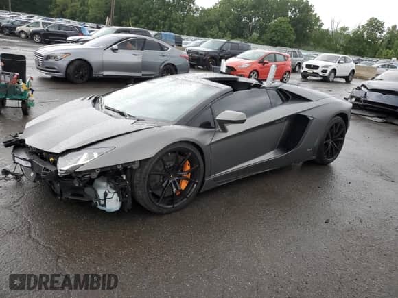 2014 Lamborghini Aventador с VIN ZHWUR1ZD6ELA03035, выставлен на аукционе Copart как лот 66784084 с пробегом 23 771 миль миль и Списание • Salvage title. История ставок и продаж доступна на DreamBid. Изображение 1.