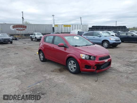 2012 Chevrolet Sonic LS with VIN 1G1JB6SHXC4114498, listed as a IAAI auction lot 42091500 with 128,638 mi miles and . Bid and sale history available at DreamBid. Image 1.