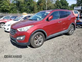 2015 Hyundai Santa Fe с VIN 5XYZU3LB4FG288019, выставлен на аукционе Copart как лот 85154945 с пробегом 144 786 миль миль и Списание • Salvage title. История ставок и продаж доступна на DreamBid. Изображение 1.