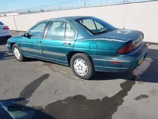 1998 Chevrolet Lumina LS z VIN 2G1WL52M5W9337396, wystawiony jako IAAI lot #43390612 z przebiegiem 451 599 mil mil oraz . Historia ofert i sprzedaży dostępna na DreamBid. Obrazek 3.