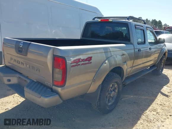 2003 Nissan Frontier XE z VIN 1N6ED29Y13C460668, wystawiony jako IAAI lot #41769859 z przebiegiem 207 323 mil mil oraz . Historia ofert i sprzedaży dostępna na DreamBid. Obrazek 4.