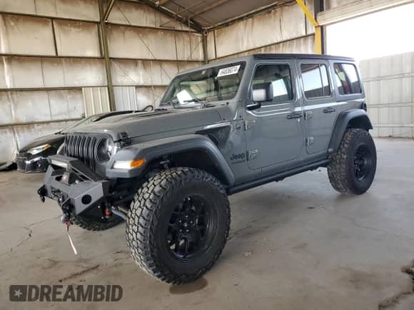 2022 Jeep Wrangler Unlimited High Tide z VIN 1C4HJXDG2NW221829, wystawiony jako Copart lot #64836074 z przebiegiem 3 394 mil mil oraz Szkoda całkowita • Salvage title. Historia ofert i sprzedaży dostępna na DreamBid. Obrazek 1.