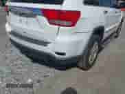 2013 Jeep Grand Cherokee Limited z VIN 1C4RJFBG8DC556272, wystawiony jako IAAI lot #43352592 z przebiegiem 118 793 mil mil oraz . Historia ofert i sprzedaży dostępna na DreamBid. Obrazek 17.